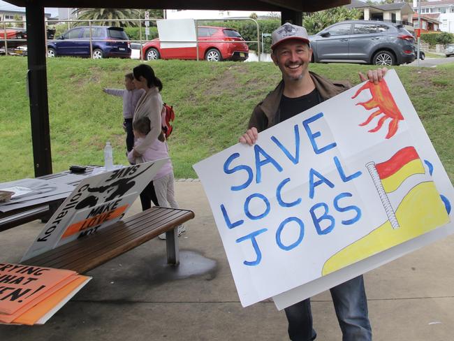 Owner of Stay Grounded cafe, Ryan O’Neill at the rally at Collaroy Beach. Picture: Monique Tyacke