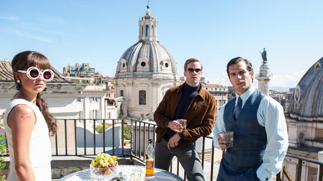 Photogenic ... Alicia Vikander, Armie Hammer and Henry Cavill have got the look.