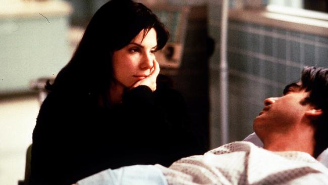 Sandra Bullock and Peter Gallagher in 1995 film While You Were Sleeping.