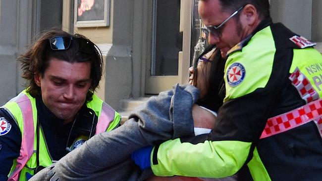 The 41-year-old woman was randomly attacked as she walked down Clarence Street. Picture: AAP