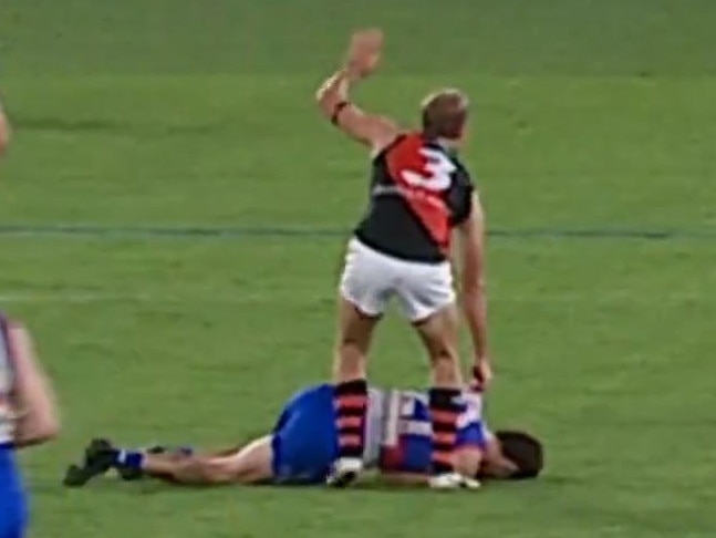 Tom Liberatore collapses to the Marvel Stadium turf.