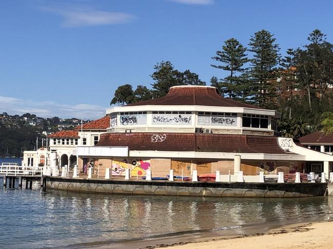 The boarded-up  former Sea Life Aquarium building in Manly Cove, Manly, on Thursday, November 30, 2023. Picture: Jim O'Rourke