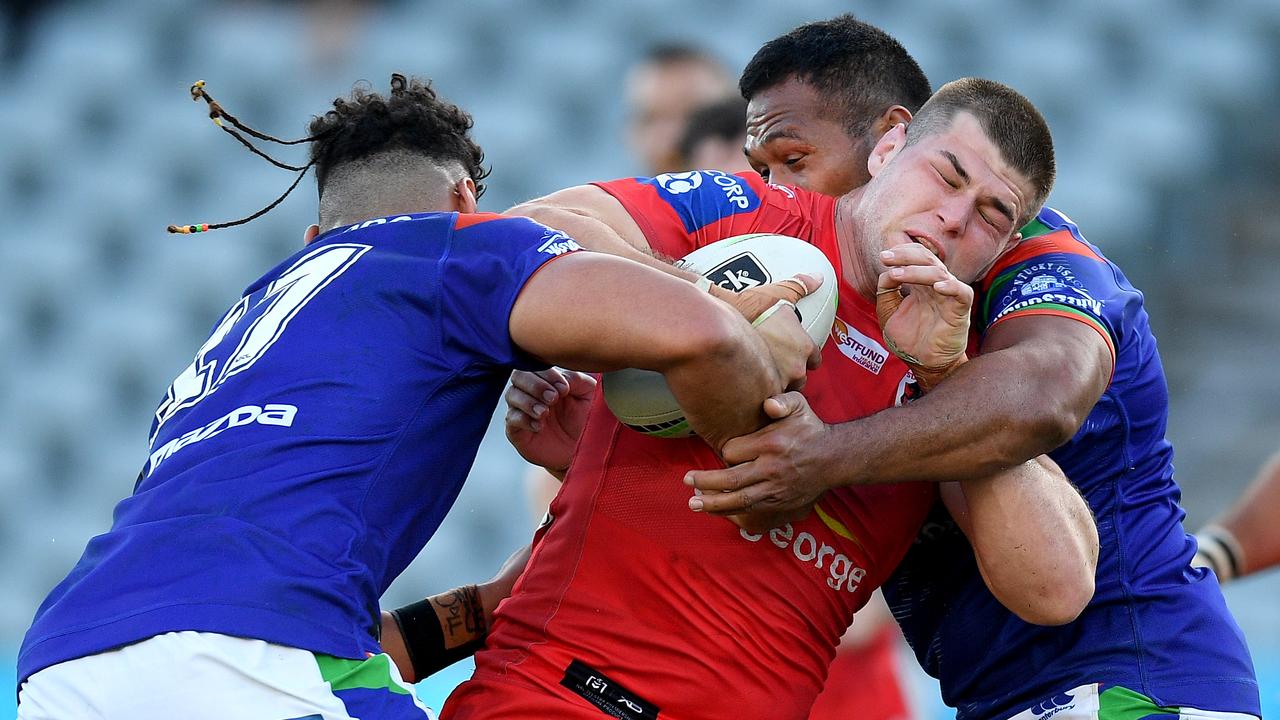 Blake Lawrie is an old-school front-rower, on the charge against the Warriors. Picture: AAP