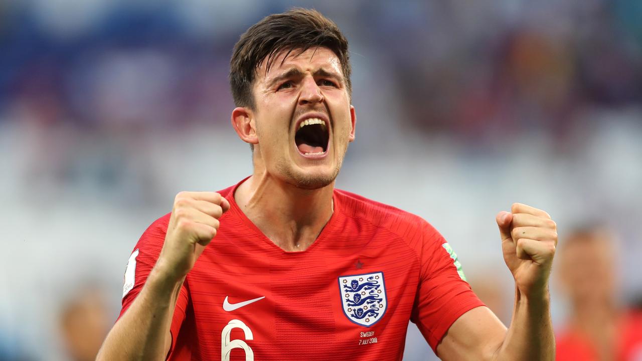 SAMARA, RUSSIA — JULY 07: Harry Maguire of England celebrates following his sides victory in the 2018 FIFA World Cup Russia Quarter Final match between Sweden and England at Samara Arena on July 7, 2018 in Samara, Russia. (Photo by Clive Rose/Getty Images)