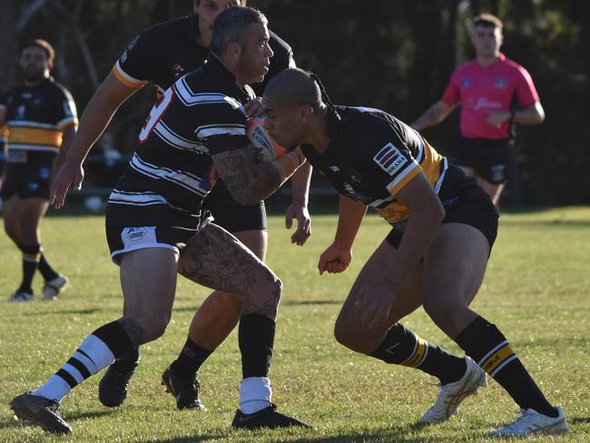 Benedict Lopeti attempts to tackle Peter Lett. Picture: Sean Teuma/NewsLocal