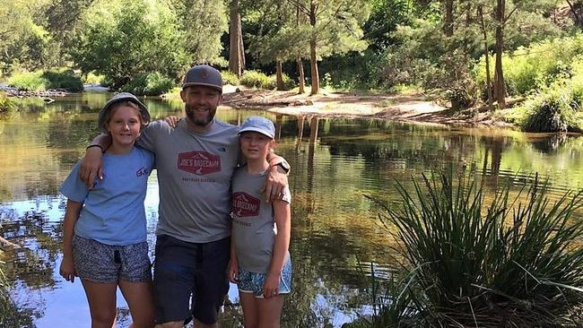 Joe Bonington, 50, from Collaroy, with his daughters Honor Bonington, 11, and Edie Bonington, 13.