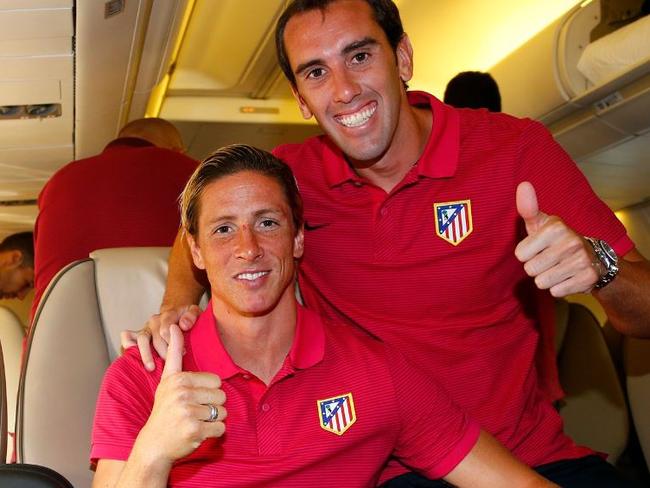 Fernando Torres and Diego Godin on the plane to Melbourne. Picture: Twitter