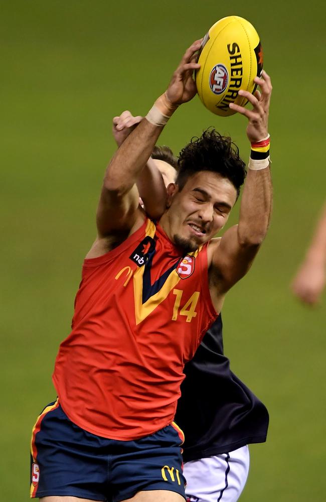 South Australia's Izak Rankine marks during the match between Victoria Metro and South Australia at the NAB AFL U18 Championships at Etihad Stadium. Picture: AAP Image/Andy Brownbill