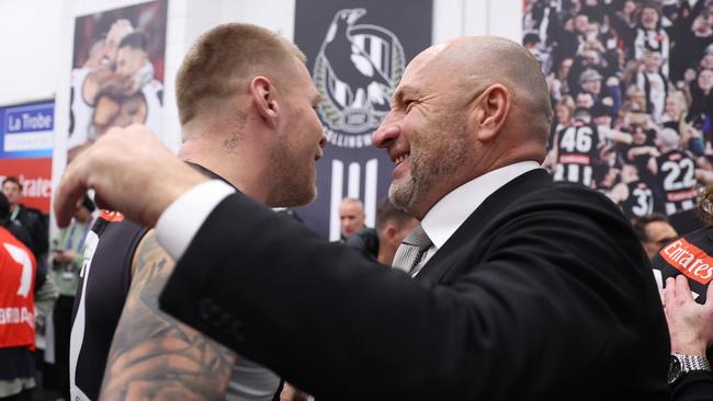 MELBOURNE, AUSTRALIA - AUGUST 03: Craig Kelly, Collingwood Magpies CEO, celebrates with Jordan De Goey of the Magpies after winning the round 21 AFL match between Collingwood Magpies and Carlton Blues at Melbourne Cricket Ground, on August 03, 2024, in Melbourne, Australia. (Photo by Daniel Pockett/Getty Images)