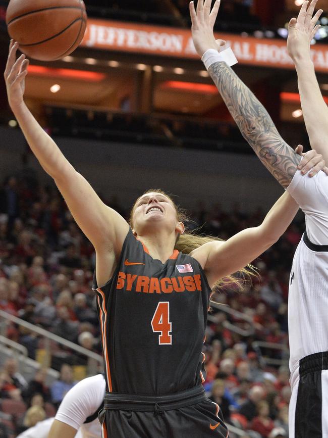 Syracuse guard Tiana Mangakahia attempts a layup past the defence of Louisville. Picture: AP Photo/Timothy D. Easley