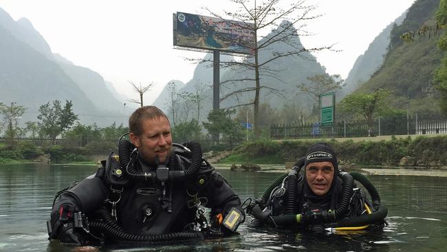 Retired Perth vet and cave diving expert Craig Challen, right, with his Adelaide diving partner Richard Harris. Rescuers rehearsed the mission in a swimming pool.