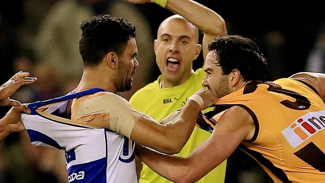 Angry Hawk Jordan Lewis takes on Kangaroo Lindsay Thomas. Picture: Wayne Ludbey