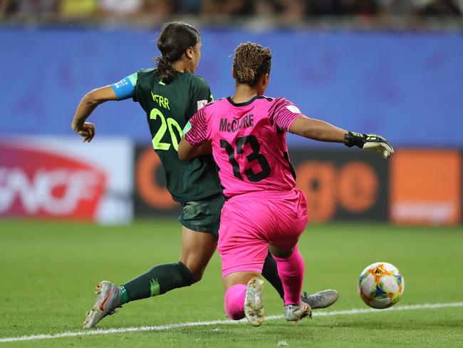 Matildas striker Sam Kerr beats Jamaica goalkeeper Nicole McClure for her fourth goal. Picture: Getty Images