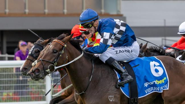 Mark Zahra drives Vibrant Sun to the line in the G1 Australasian Oaks. Picture: Makoto Kaneko.