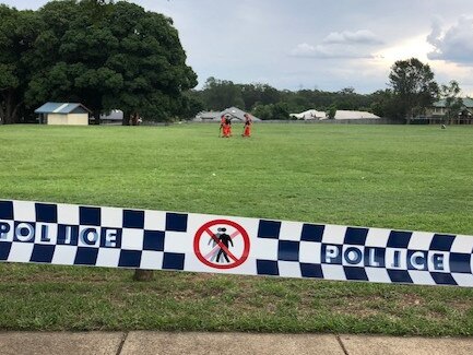 SES volunteers scour Svoboda Park in Kuraby for evidence. Photo: Danielle Buckley