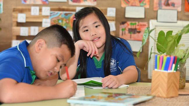 Leanyer Primary School students Marcus Barzaga and Jolin Lay are among a cohort who achieved a 94 per cent attendance this year. Picture: Julianne Osborne