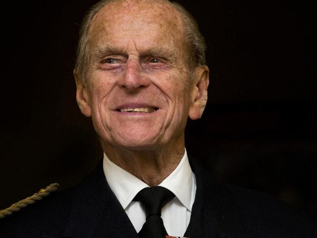 (FILES) In this file photo taken on November 23, 2011 Britain's Prince Philip, the Duke of Edinburgh, smiles as he visits the Admiralty Board and Admiralty House in central London, on November 23, 2011, where he formally received Letters Patent as the holder of the title and office of Lord High Admiral. - Queen Elizabeth II's 99-year-old husband Prince Philip, who was recently hospitalised and underwent a successful heart procedure, died on April 9, 2021, Buckingham Palace announced. (Photo by CARL COURT / AFP)