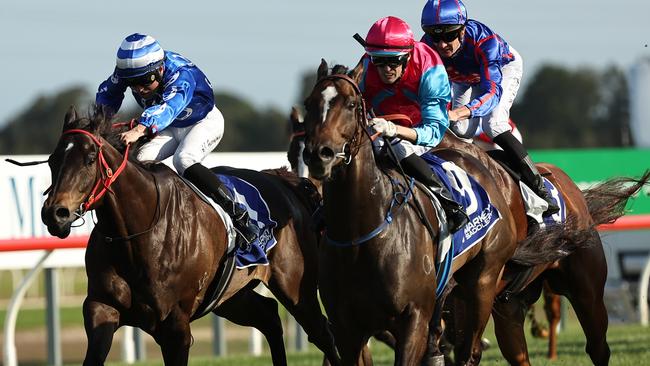 Headwall finishes over the top of Dragonstone to win The Warra. Picture: Jeremy Ng/Getty Images