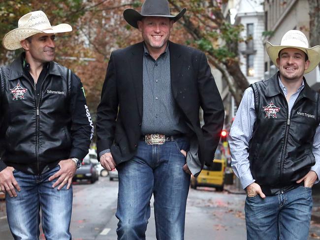 06/06/2018: Left to right; Guilherme Marchi, PBR CEO Sean Gleason and Matt Triplett in Pitt St, Sydney. They are in Sydney for the PBR Global Cup bull riding event.Pic by James Croucher