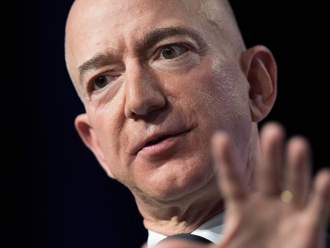 (FILES) In this file photo taken on September 19, 2018 Amazon and Blue Origin founder Jeff Bezos provides the keynote address at the Air Force Association's Annual Air, Space & Cyber Conference in Oxen Hill, Maryland. - Jeff Bezos remains the world's richest person, ahead of Bill Gates and Warren Buffett, according to the latest Forbes list of the ultra wealthy. But while things are largely stable up top in that ranking, Facebook founder Mark Zuckerberg dropped three spots and former New York mayor Michael Bloomberg rose by two. According to the list announced March 4, 2019 by Forbes, the riches of Bezos, 55, have swelled by $19 billion in one year and he is now worth $131 billion. (Photo by Jim WATSON / AFP)