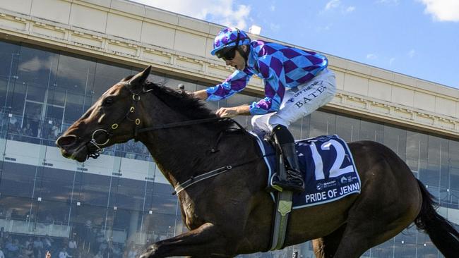 MELBOURNE, AUSTRALIA - MARCH 16: Declan Bates riding Pride of Jenni defeats Craig Williams riding Mr Brightside and Cascadian in Race 8, the The Sharp Eit All-star Mile, during The All-Star Mile Race Day at Caulfield Racecourse on March 16, 2024 in Melbourne, Australia. (Photo by Vince Caligiuri/Getty Images)