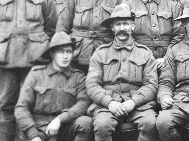 Group portrait of non-commissioned officers, 12th Field Company Engineers, 4th Australian Division. Back row, left to right: 5449 Lance Corporal (l Cpl) A Randall; 3312 2nd Corporal W Irwin; 5079 L Cpl GT Lawry; 149 L Cpl AT Burton; 5073 l Cpl PD Kennedy; 5632 L Cpl J N Button; 2518 L Cpl JC Sloper; 2966 L Cpl WR Aexander; 2472 LCpl GT Cooper; 4238 L Cpl G Redman; 5067 L Cpl CA Guildford; 3356 2nd Cpl TB Hills. Middle row: 5638 L Cpl R Edwards; 3068 2nd Cpl A Easy; 374 Corporal W Simpson; 2991 2nd Cpl EC Cox; 3019 Cpl A Fry; 3122 Cpl MS Seddon; 2020 Cpl C Bowd; 378 Cpl DC Stewart; 5437 Cpl W Fleming; 2817 2nd Cpl HN Sarina; 5456 2nd Cpl CD Stewart. Front row: 6211 L Cpl AE Dean; 5461 Sergeant (Sgt) WHG Wakeham; 5463 Sgt T W Whitehead; 209 Company Quartermaster-Sergeant W Cridland; 3 Warrant Officer Class 1 A Thomson; 11 Farrier Sergeant J Longmore; 3352 Sgt WH Lister; 2525 Sgt E Wilkinson; 308 Cpl GE Gabreil. Absentees: 2964 L Cpl HC Armstrong; 2984 Sgt AE Cother; 2998 2nd Cpl HG Willey; 2069 L Cpl J Parker.  Picture: Australian War Memorial.