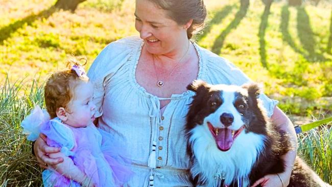 Baby Stephanie with mum Priscilla Haley and dog Kiddo. Picture: Contributed