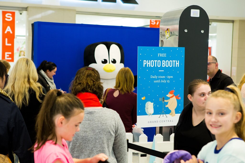 Grand Central's free photo booth is popular these school holidays. Grab your friends & family and snap a selfie with the friendly polar bear or penguin. Picture: Contributed