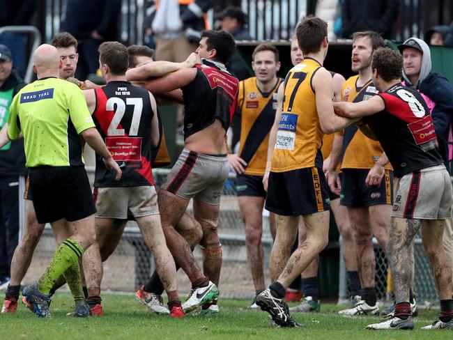 Tempers flare at Coburg City Oval. Picture: Mark Dadswell