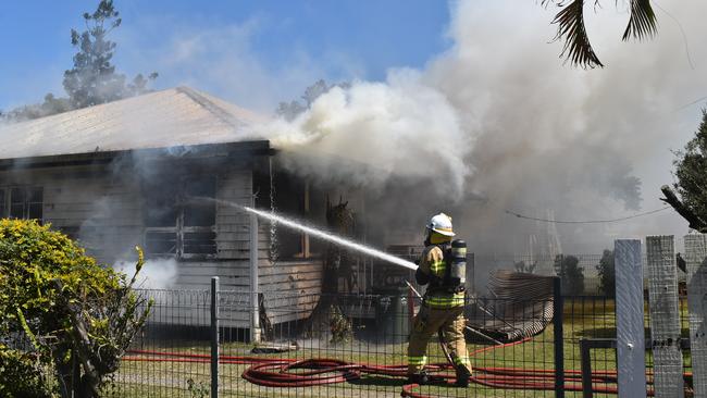 Firefighters fought the blaze that consumed a Racecourse home. Picture: Lillian Watkins
