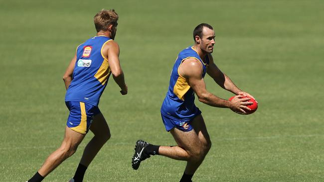 West Coast skipper Shannon Hurn, right, will miss the clash with the Swans after suffering a minor hamstring strain last week.