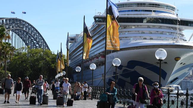 Cruise ship passengers disembark from the Ruby Princess at Circular Quay in March. Picture: AAP Image/Dean Lewins