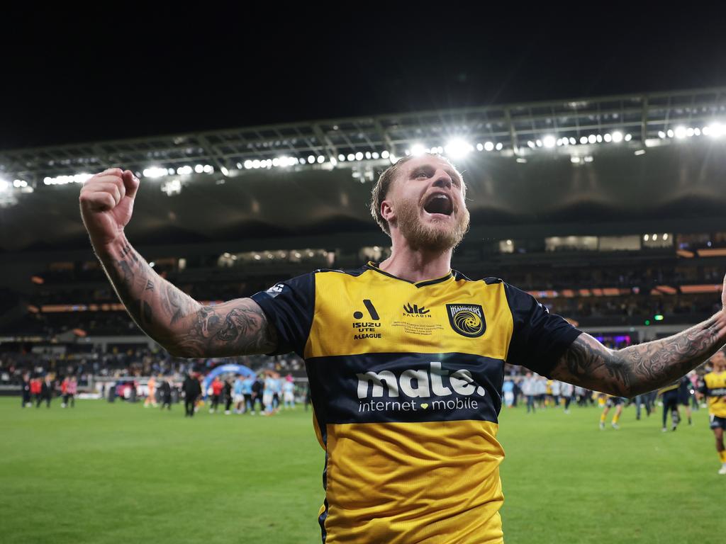 Jason Cummings celebrates the Mariners’ grand final win. Picture: Mark Metcalfe/Getty Images