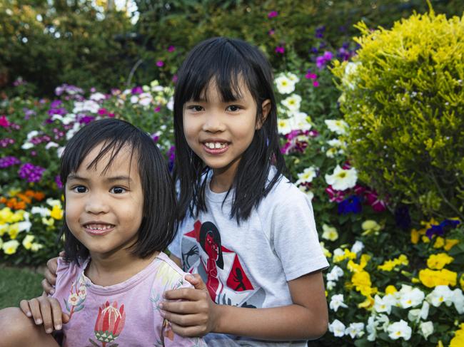 Sisters Gia (left) and Sophie Dang in The Chronicle Garden Competition City Reserve Grand Champion garden of Cheryl Ganzer during the Carnival of Flowers, Saturday, September 21, 2024. Picture: Kevin Farmer