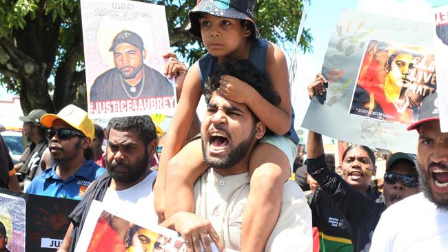 Algen Donahue, joined by hundreds takes to the street of Mareeba to protest the death of his twin brother Aubrey Donahue who was killed by police on Saturday. Picture: Peter Carruthers