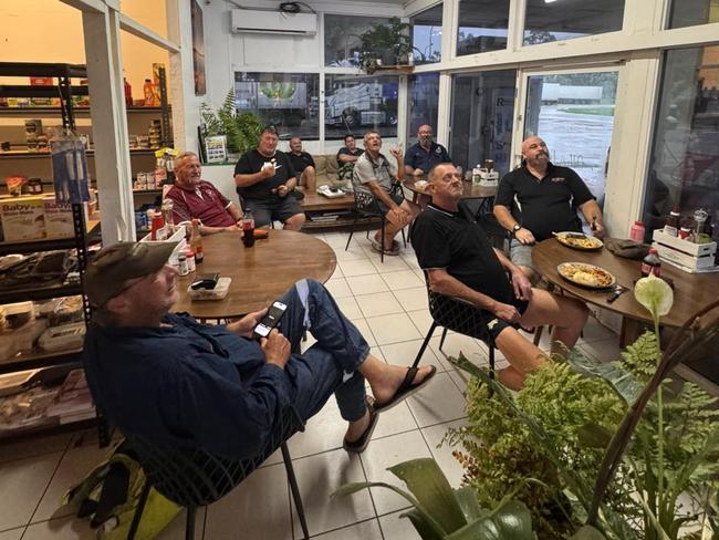 Stranded travellers gathered at the Greenvale Roadhouse on February 9, appreciating donations from the community. Picture: Supplied.