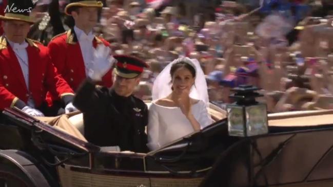 Royal Wedding: Harry and Meghan wave to fans during carriage ride