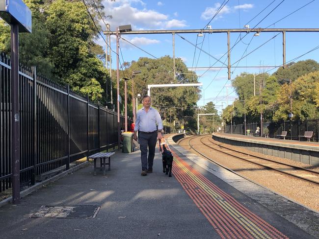 Vision Australia’s general manager of corporate affairs and advocacy Chris Edwards walks along Kooyong railway station, which has the TGSIs installed. Picture: Vision Australia