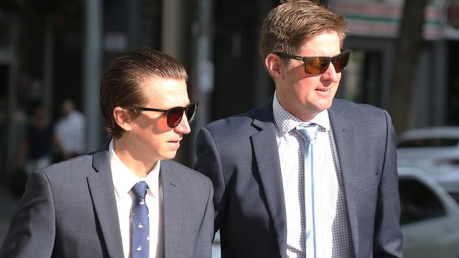 William Hernan and Jarrod McLean arrive at the County Court of Victoria on Friday.