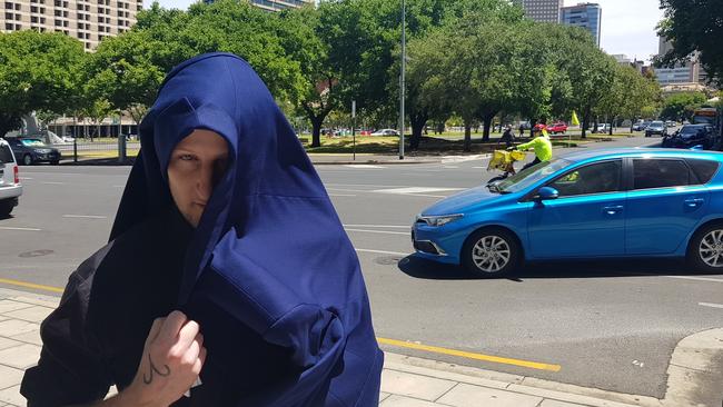 Superannuation scammer Christopher Lloyd George outside the Adelaide Magistrates Court. Picture: Sean Fewster.