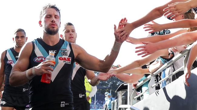 A relieved Travis Boak leads the team off after the close shave. Picture SARAH REED