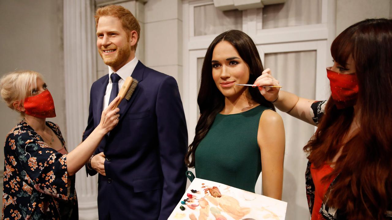 Prince Harry, Duke of Sussex, and Meghan, Duchess of Sussex, at Madame Tussauds. Picture: Tolga Akmen/AFP