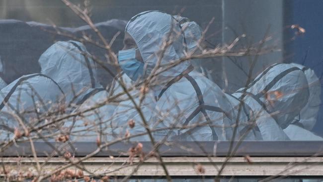 Members of the World Health Organization team investigating the origins of the COVID-19 coronavirus in Wuhan, China. Picture: Hector Retamal/ AFP