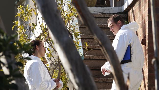 Forensic workers arrive to a house in Marine Parade in Avalon after the body of Lanell Latta was found on Monday. Picture: AAP