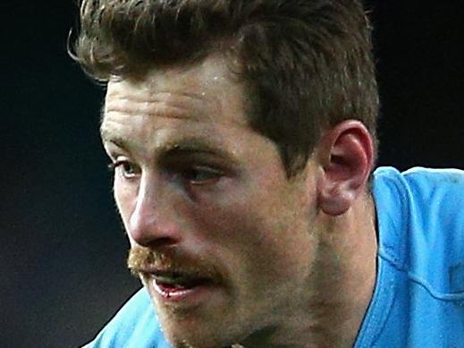SYDNEY, AUSTRALIA - JULY 06: Bernard Foley of the Waratahs makes a break during the round 18 Super Rugby match between the Waratahs and the Highlanders at Allianz Stadium on July 6, 2014 in Sydney, Australia. (Photo by Cameron Spencer/Getty Images)
