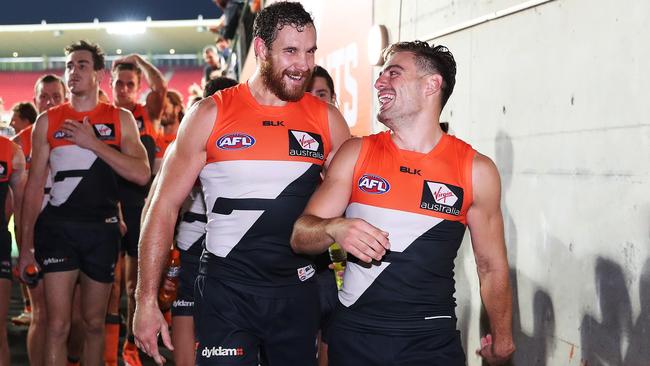 Shane Mumford and teammates Stephen Coniglio celebrate another Giants win. Picture: Phil Hillyard