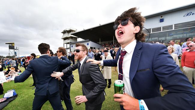 2015. Racegoers cheered on a winner at the cup. Picture: NIGEL HALLETT