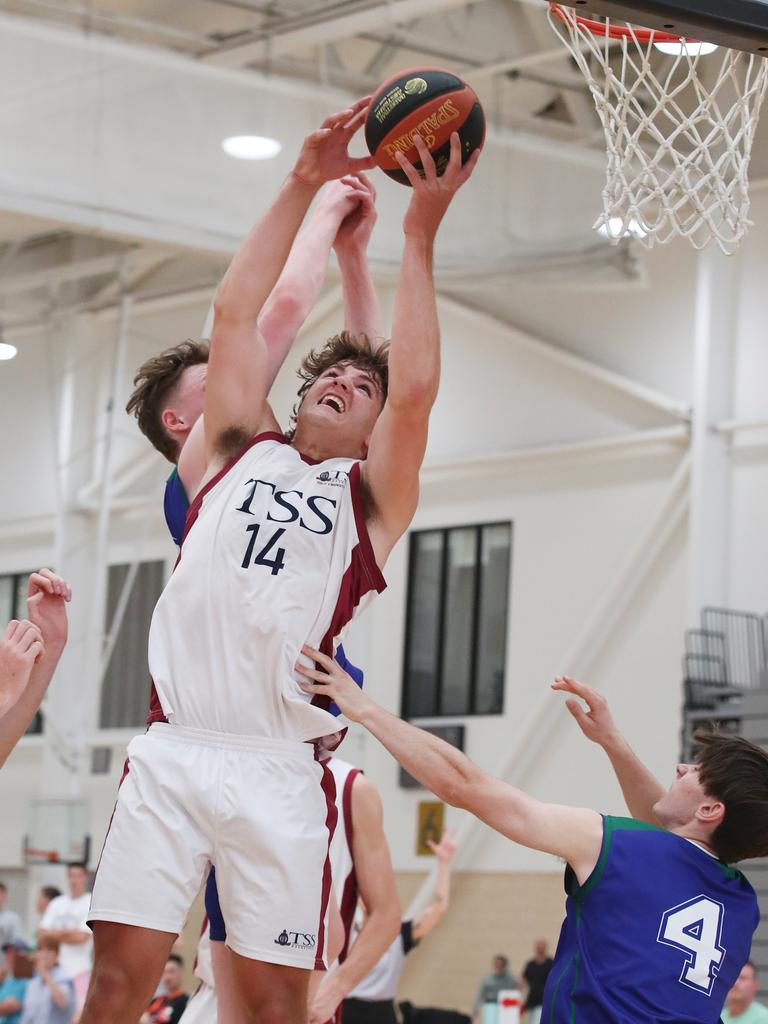 Basketball Australia Schools Championships at Carrara. Mens open final, Lake Ginninderra College Lakers V TSS (in white). Tss's Nikos Karathanasopoulos takes a rebound in the final. Picture Glenn Hampson