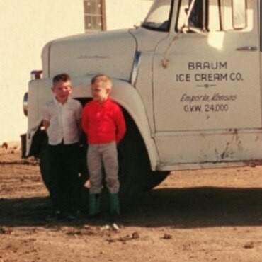 Throughout childhood, Bill Braum helped his father Henry H. Braum with the family business learning every aspect of the operation.