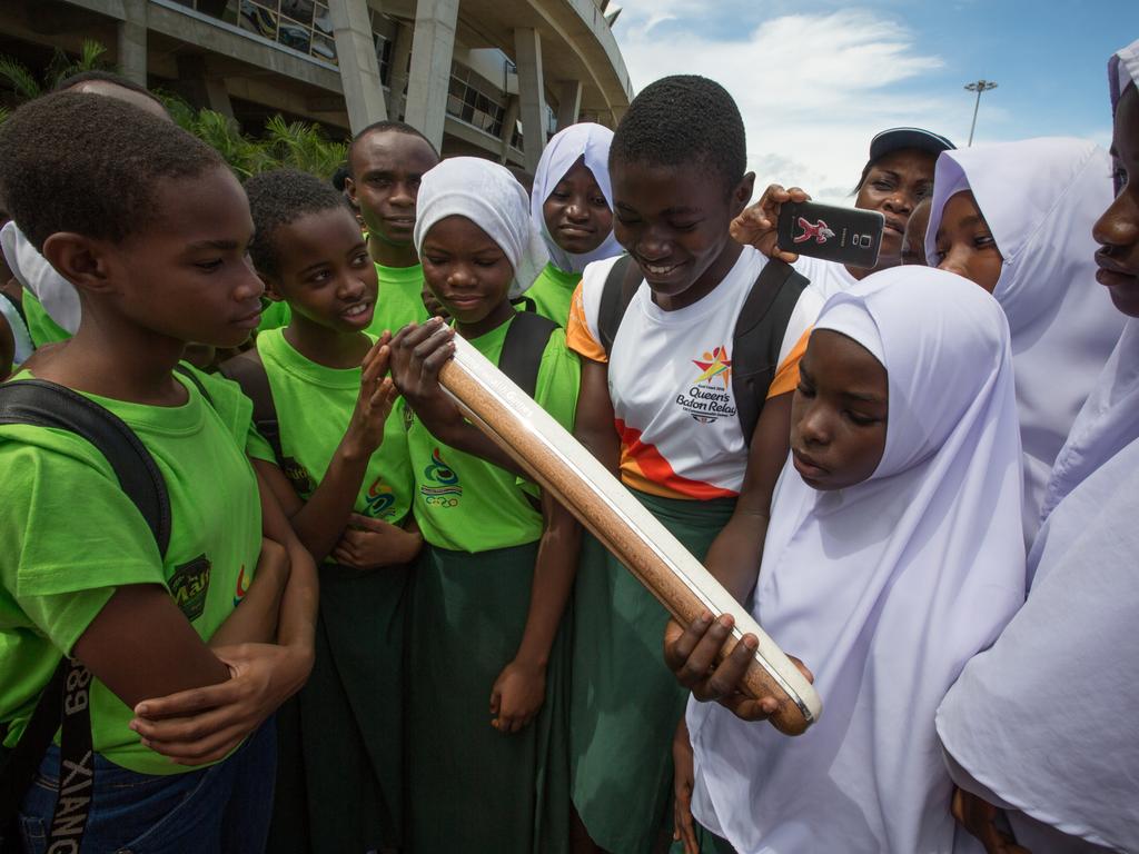 The Queen’s Baton is presented to children, prior to being carried in relay by athletes, school children and sponsors, through the city to State House, in Dar Es Salaam, in Tanzania, on 9 April 2017.